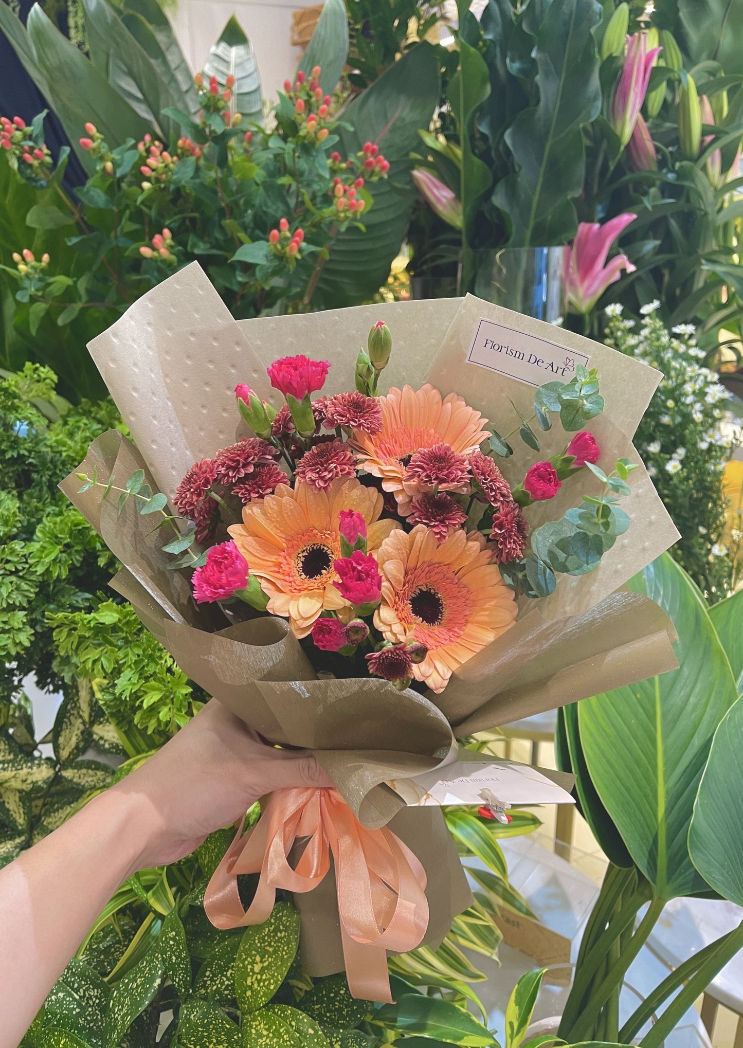 Orangey Gerberras with Pink decorative flowers