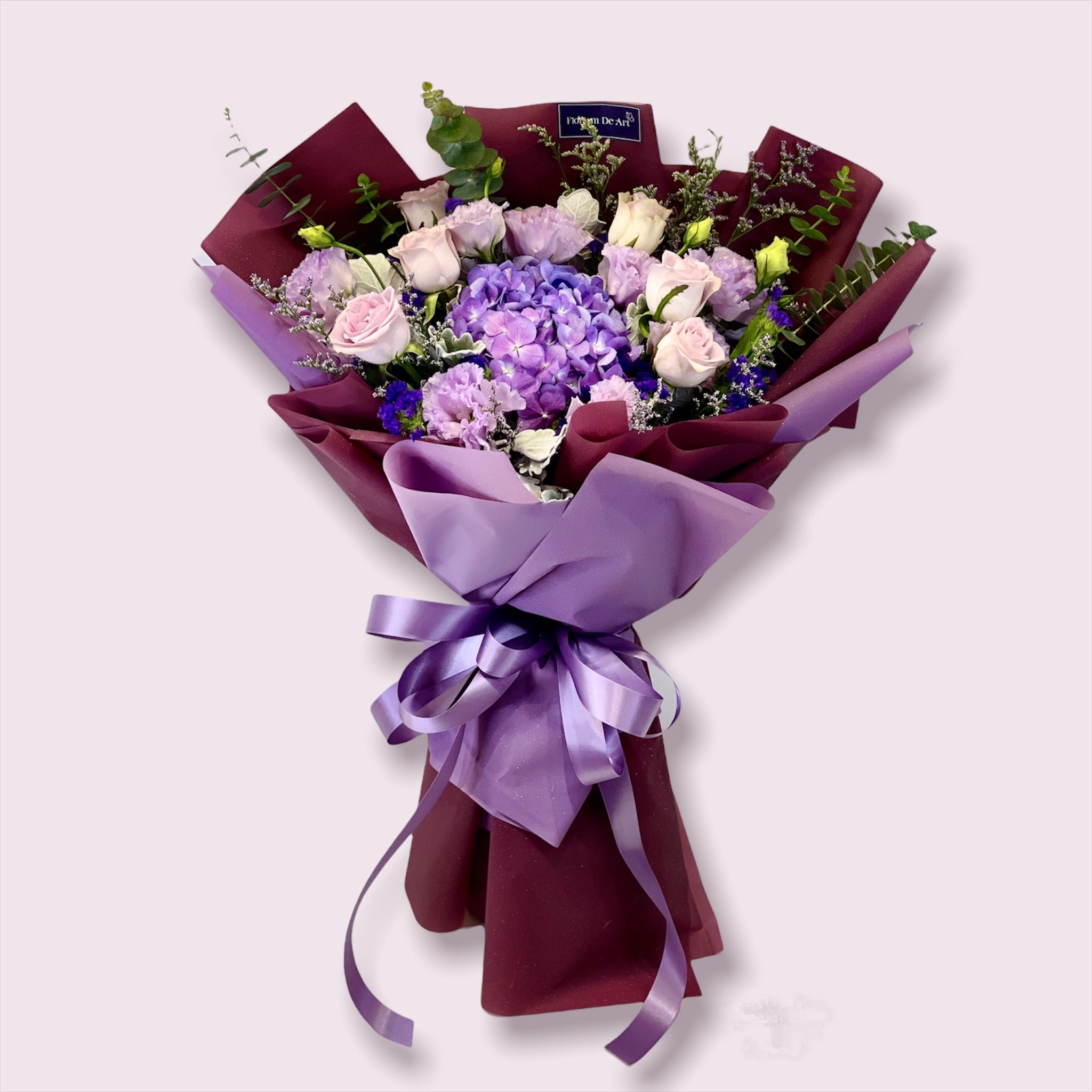 Purple flowers in bouquet top